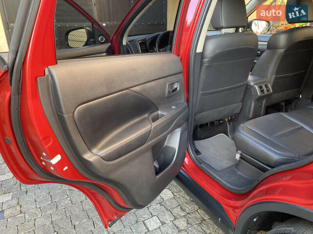 Красный Мицубиси Аутлендер, объемом двигателя 3 л и пробегом 106 тыс. км за 20700 $, фото 51 на Automoto.ua