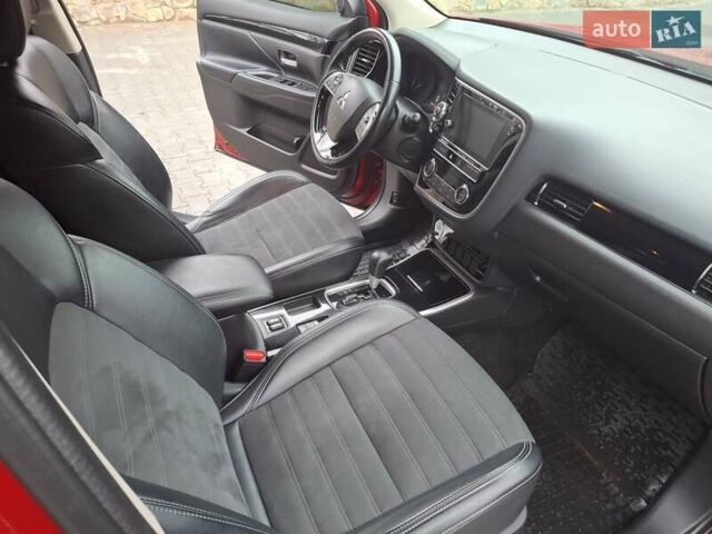 Красный Мицубиси Аутлендер, объемом двигателя 2.36 л и пробегом 110 тыс. км за 19000 $, фото 10 на Automoto.ua