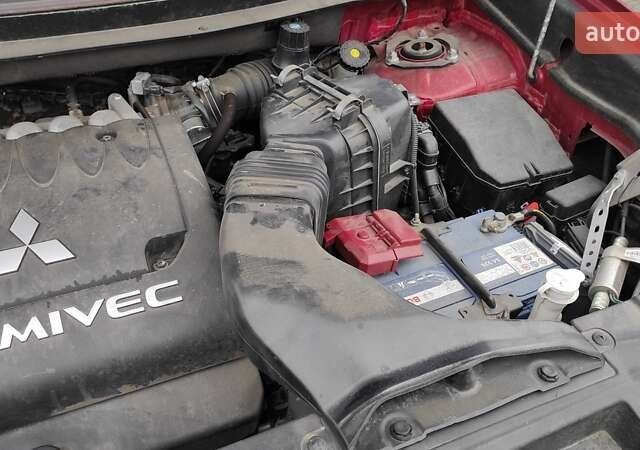 Червоний Міцубісі Аутлендер, об'ємом двигуна 3 л та пробігом 127 тис. км за 28500 $, фото 20 на Automoto.ua