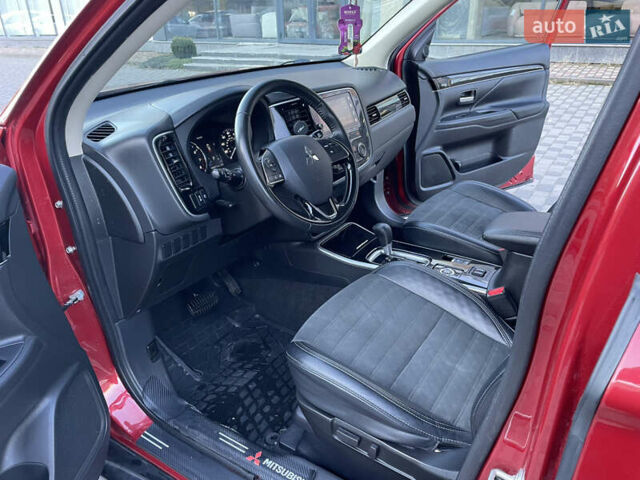 Красный Мицубиси Аутлендер, объемом двигателя 2.36 л и пробегом 100 тыс. км за 16500 $, фото 10 на Automoto.ua