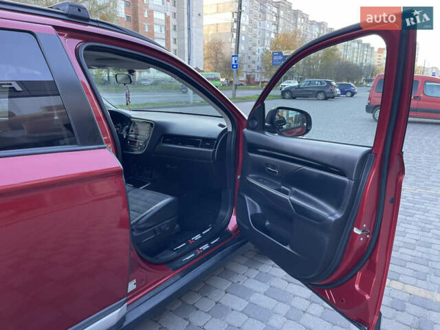 Красный Мицубиси Аутлендер, объемом двигателя 2.36 л и пробегом 100 тыс. км за 16500 $, фото 8 на Automoto.ua