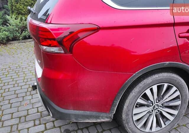 Червоний Міцубісі Аутлендер, об'ємом двигуна 3 л та пробігом 127 тис. км за 28500 $, фото 27 на Automoto.ua