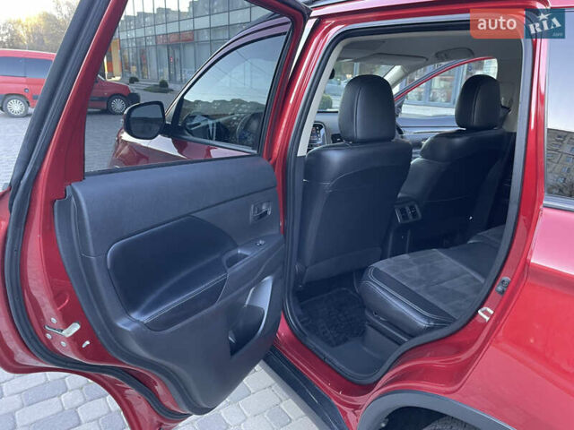 Красный Мицубиси Аутлендер, объемом двигателя 2.36 л и пробегом 100 тыс. км за 16500 $, фото 12 на Automoto.ua