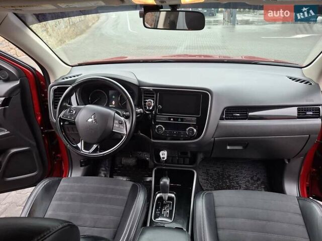 Красный Мицубиси Аутлендер, объемом двигателя 2.36 л и пробегом 110 тыс. км за 19000 $, фото 16 на Automoto.ua