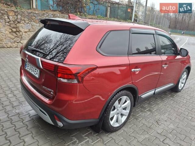 Красный Мицубиси Аутлендер, объемом двигателя 2.36 л и пробегом 110 тыс. км за 19000 $, фото 7 на Automoto.ua