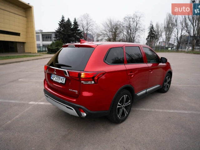 Красный Мицубиси Аутлендер, объемом двигателя 2.36 л и пробегом 145 тыс. км за 17000 $, фото 18 на Automoto.ua