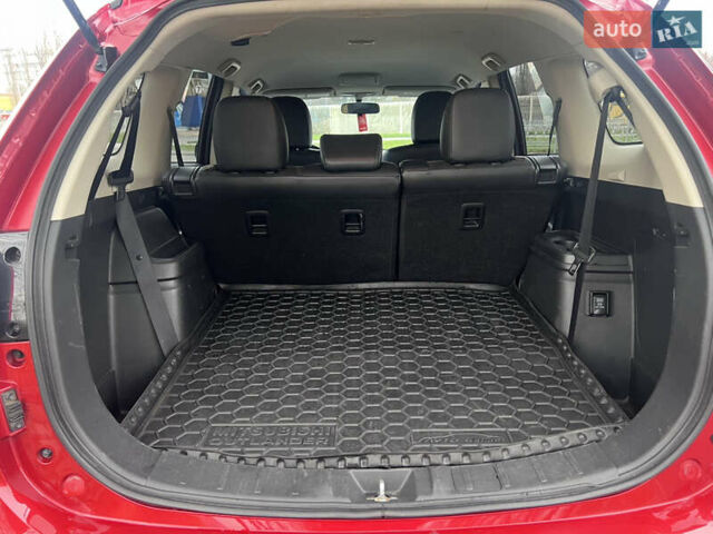 Червоний Міцубісі Аутлендер, об'ємом двигуна 2.36 л та пробігом 148 тис. км за 16500 $, фото 4 на Automoto.ua
