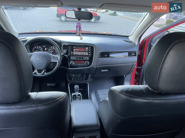 Красный Мицубиси Аутлендер, объемом двигателя 2.36 л и пробегом 100 тыс. км за 16500 $, фото 14 на Automoto.ua