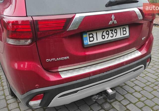 Червоний Міцубісі Аутлендер, об'ємом двигуна 3 л та пробігом 127 тис. км за 28500 $, фото 29 на Automoto.ua