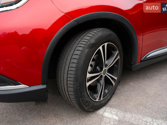 Красный Мицубиси Аутлендер, объемом двигателя 2.36 л и пробегом 145 тыс. км за 17000 $, фото 20 на Automoto.ua