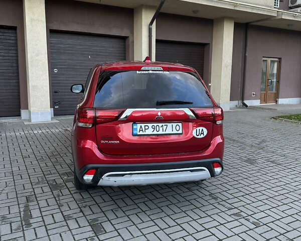 Червоний Міцубісі Аутлендер, об'ємом двигуна 2.36 л та пробігом 95 тис. км за 12500 $, фото 5 на Automoto.ua
