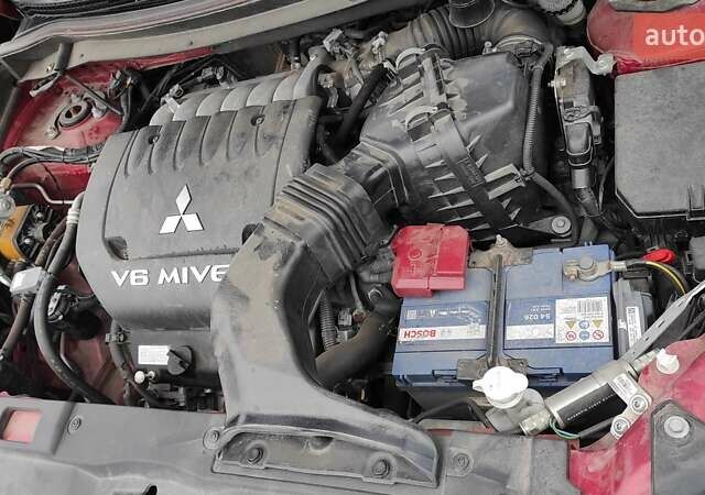 Червоний Міцубісі Аутлендер, об'ємом двигуна 3 л та пробігом 127 тис. км за 28500 $, фото 21 на Automoto.ua