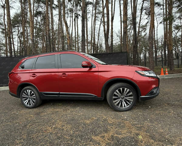 Красный Мицубиси Аутлендер, объемом двигателя 2.4 л и пробегом 197 тыс. км за 18700 $, фото 6 на Automoto.ua