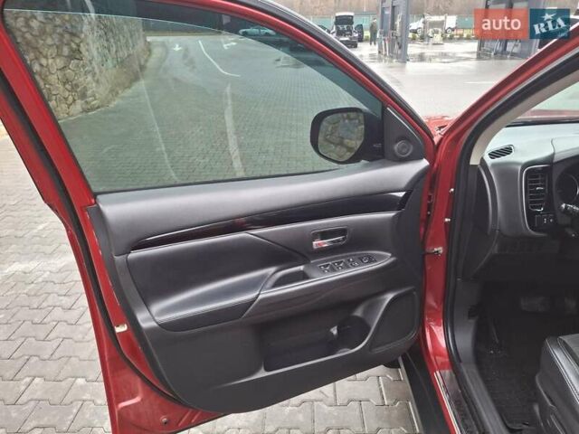 Красный Мицубиси Аутлендер, объемом двигателя 2.36 л и пробегом 110 тыс. км за 19000 $, фото 8 на Automoto.ua