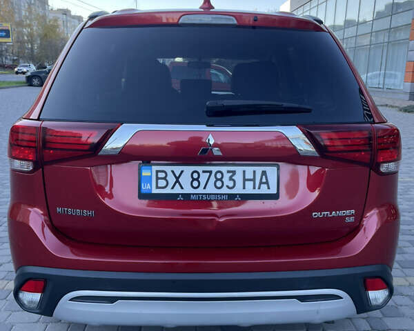 Красный Мицубиси Аутлендер, объемом двигателя 2.36 л и пробегом 100 тыс. км за 16500 $, фото 24 на Automoto.ua
