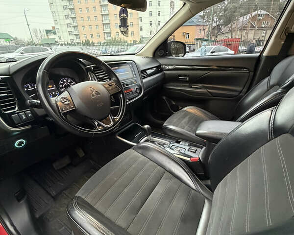 Красный Мицубиси Аутлендер, объемом двигателя 2.4 л и пробегом 197 тыс. км за 18700 $, фото 8 на Automoto.ua