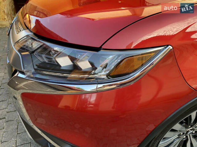 Красный Мицубиси Аутлендер, объемом двигателя 3 л и пробегом 106 тыс. км за 20700 $, фото 15 на Automoto.ua