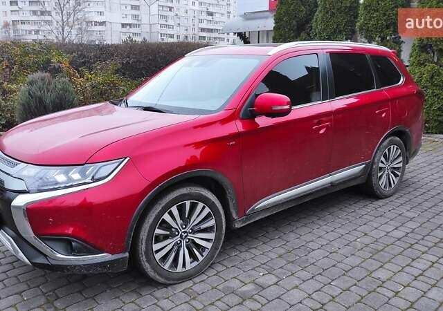 Червоний Міцубісі Аутлендер, об'ємом двигуна 3 л та пробігом 127 тис. км за 28500 $, фото 4 на Automoto.ua