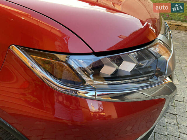 Красный Мицубиси Аутлендер, объемом двигателя 3 л и пробегом 106 тыс. км за 20700 $, фото 16 на Automoto.ua