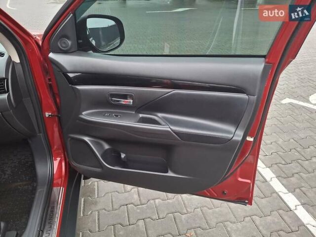 Красный Мицубиси Аутлендер, объемом двигателя 2.36 л и пробегом 110 тыс. км за 19000 $, фото 11 на Automoto.ua