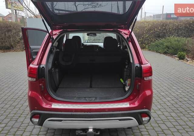 Червоний Міцубісі Аутлендер, об'ємом двигуна 3 л та пробігом 127 тис. км за 28500 $, фото 16 на Automoto.ua