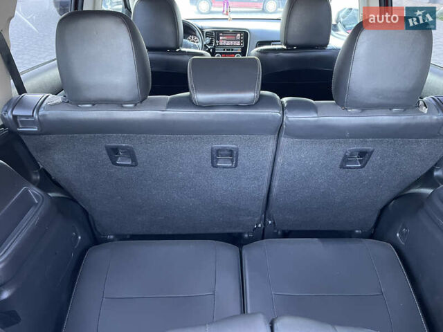 Красный Мицубиси Аутлендер, объемом двигателя 2.36 л и пробегом 100 тыс. км за 16500 $, фото 29 на Automoto.ua