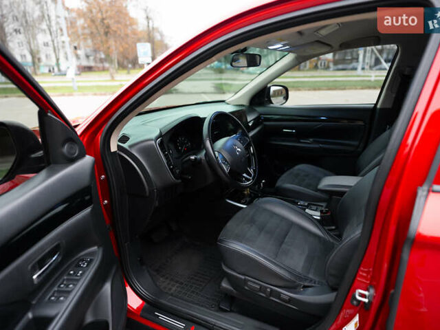 Красный Мицубиси Аутлендер, объемом двигателя 2.36 л и пробегом 145 тыс. км за 17000 $, фото 9 на Automoto.ua