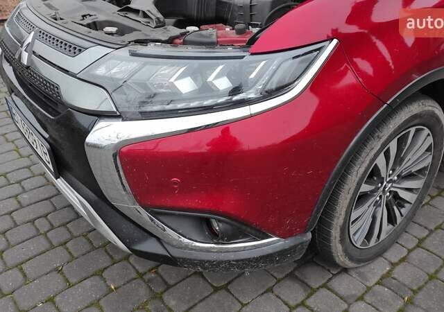 Червоний Міцубісі Аутлендер, об'ємом двигуна 3 л та пробігом 127 тис. км за 28500 $, фото 22 на Automoto.ua