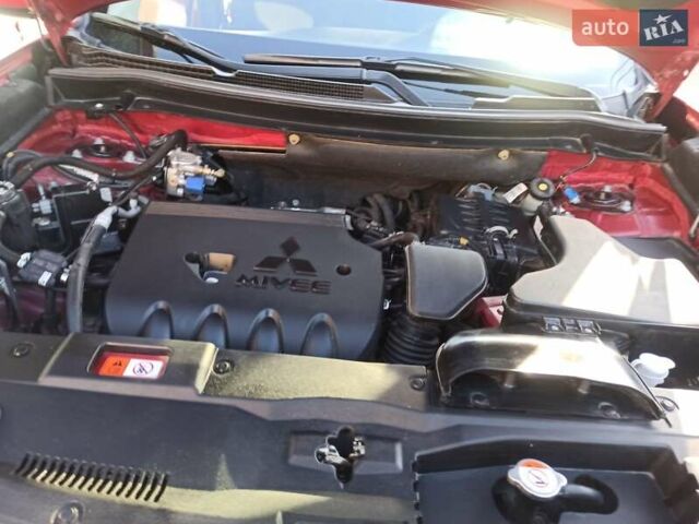 Червоний Міцубісі Аутлендер, об'ємом двигуна 2.36 л та пробігом 31 тис. км за 19200 $, фото 15 на Automoto.ua