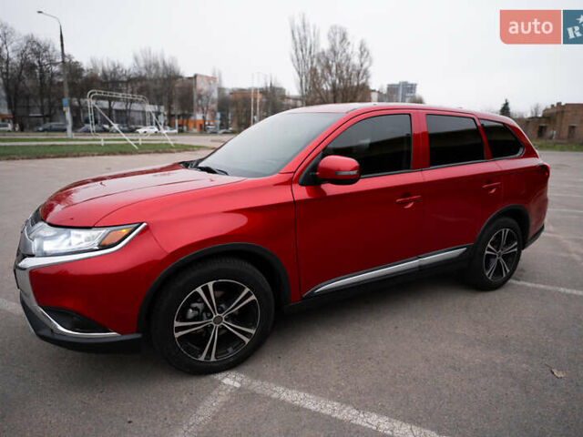 Красный Мицубиси Аутлендер, объемом двигателя 2.36 л и пробегом 145 тыс. км за 17000 $, фото 14 на Automoto.ua