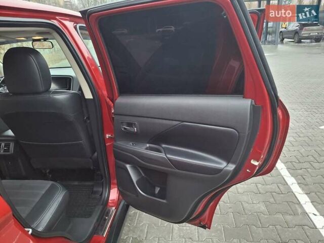 Красный Мицубиси Аутлендер, объемом двигателя 2.36 л и пробегом 110 тыс. км за 19000 $, фото 14 на Automoto.ua