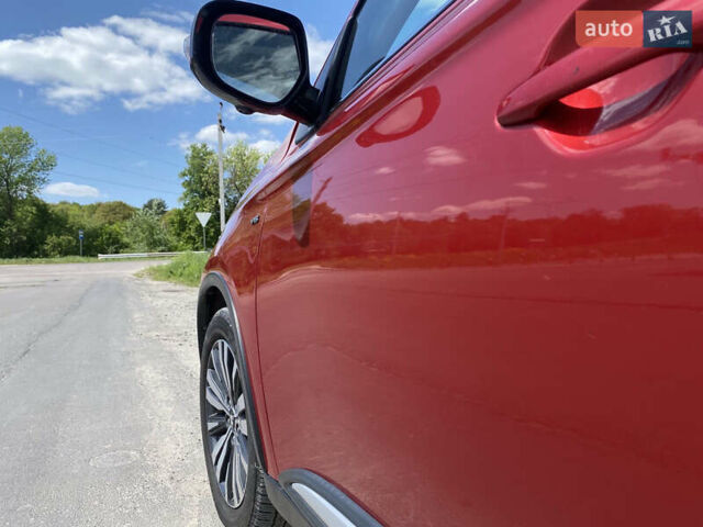 Красный Мицубиси Аутлендер, объемом двигателя 3 л и пробегом 106 тыс. км за 20700 $, фото 7 на Automoto.ua