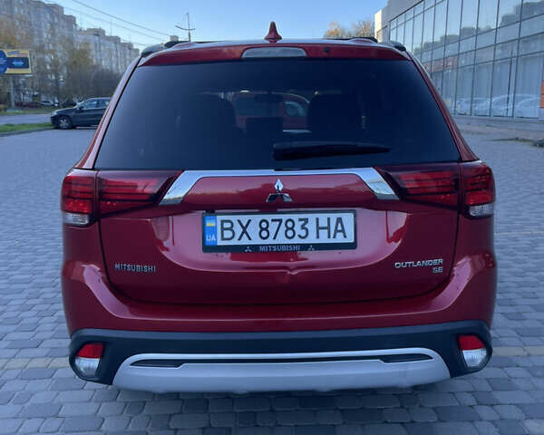 Красный Мицубиси Аутлендер, объемом двигателя 2.36 л и пробегом 100 тыс. км за 16500 $, фото 5 на Automoto.ua