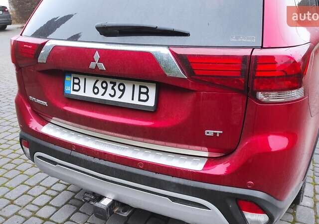 Червоний Міцубісі Аутлендер, об'ємом двигуна 3 л та пробігом 127 тис. км за 28500 $, фото 28 на Automoto.ua