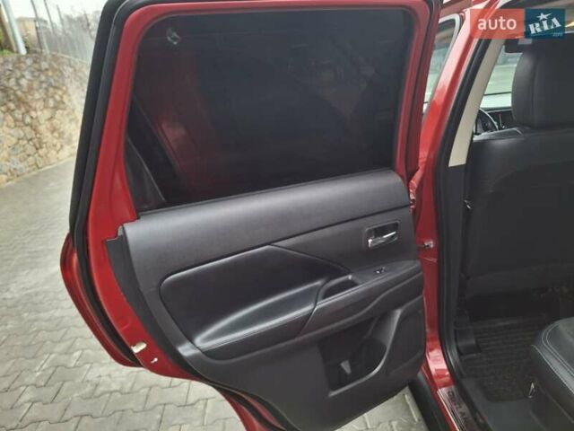 Красный Мицубиси Аутлендер, объемом двигателя 2.36 л и пробегом 110 тыс. км за 19000 $, фото 15 на Automoto.ua