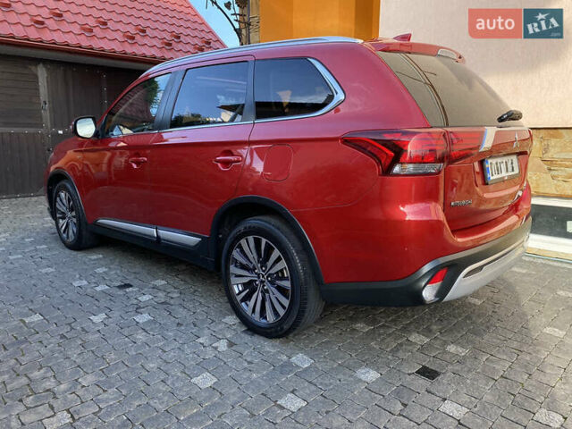 Красный Мицубиси Аутлендер, объемом двигателя 3 л и пробегом 106 тыс. км за 20700 $, фото 8 на Automoto.ua