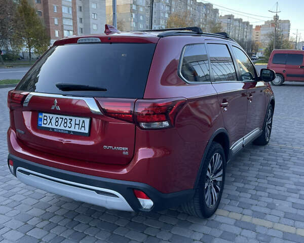 Красный Мицубиси Аутлендер, объемом двигателя 2.36 л и пробегом 100 тыс. км за 16500 $, фото 6 на Automoto.ua