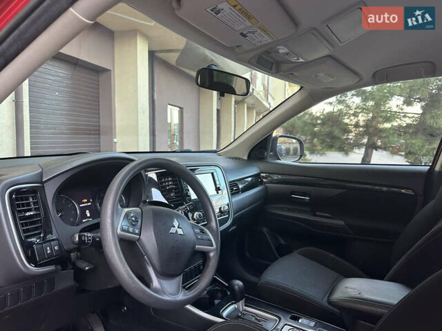 Червоний Міцубісі Аутлендер, об'ємом двигуна 2.36 л та пробігом 95 тис. км за 12500 $, фото 3 на Automoto.ua
