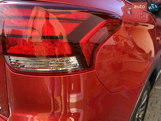 Красный Мицубиси Аутлендер, объемом двигателя 3 л и пробегом 106 тыс. км за 20700 $, фото 11 на Automoto.ua