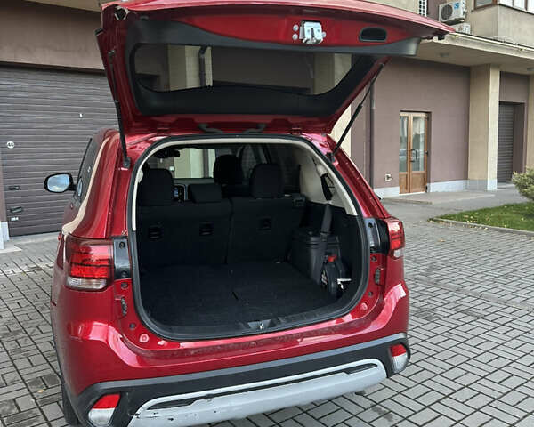 Червоний Міцубісі Аутлендер, об'ємом двигуна 2.36 л та пробігом 95 тис. км за 12500 $, фото 4 на Automoto.ua