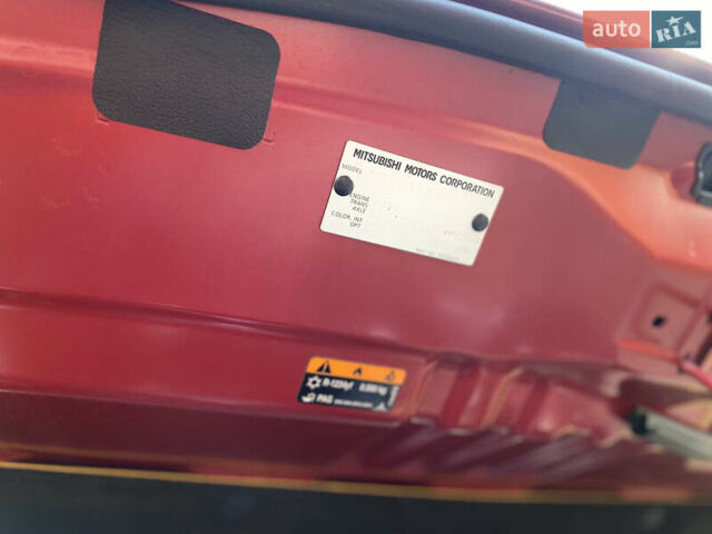 Красный Мицубиси Аутлендер, объемом двигателя 3 л и пробегом 106 тыс. км за 20700 $, фото 60 на Automoto.ua