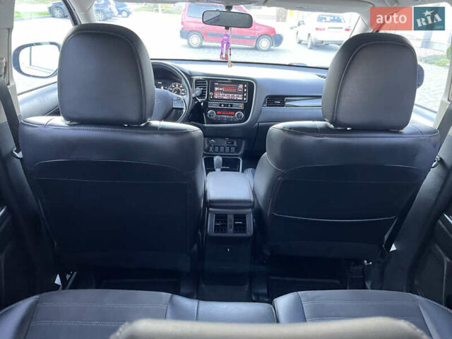 Красный Мицубиси Аутлендер, объемом двигателя 2.36 л и пробегом 100 тыс. км за 16500 $, фото 30 на Automoto.ua