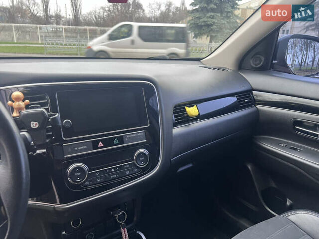 Червоний Міцубісі Аутлендер, об'ємом двигуна 2.36 л та пробігом 148 тис. км за 16500 $, фото 6 на Automoto.ua