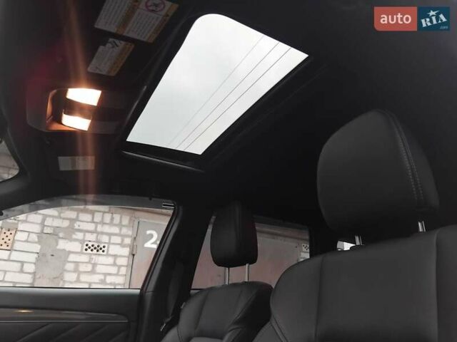 Красный Мицубиси Аутлендер, объемом двигателя 2 л и пробегом 53 тыс. км за 22800 $, фото 2 на Automoto.ua