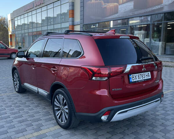 Красный Мицубиси Аутлендер, объемом двигателя 2.36 л и пробегом 100 тыс. км за 16500 $, фото 4 на Automoto.ua