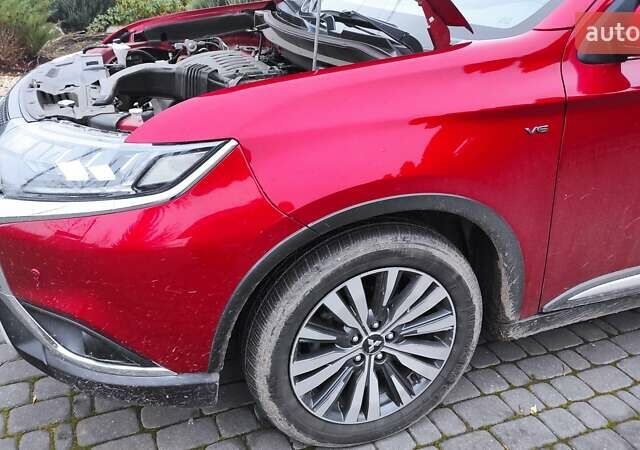 Червоний Міцубісі Аутлендер, об'ємом двигуна 3 л та пробігом 127 тис. км за 28500 $, фото 32 на Automoto.ua