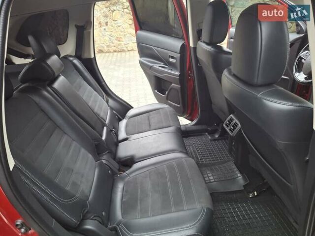 Красный Мицубиси Аутлендер, объемом двигателя 2.36 л и пробегом 110 тыс. км за 19000 $, фото 13 на Automoto.ua