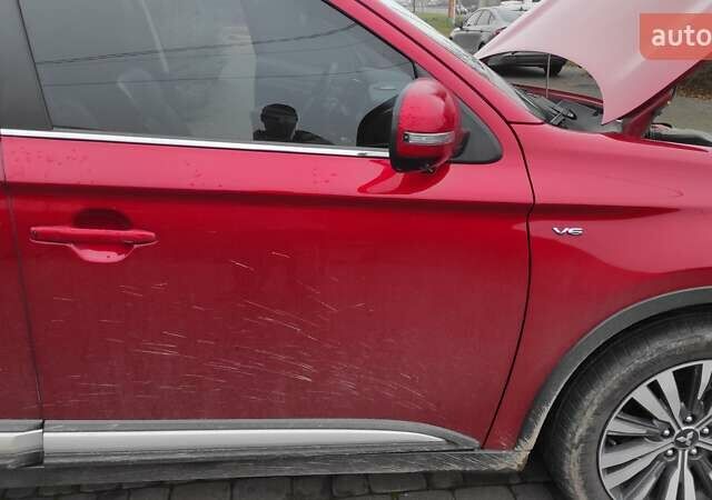 Червоний Міцубісі Аутлендер, об'ємом двигуна 3 л та пробігом 127 тис. км за 28500 $, фото 25 на Automoto.ua
