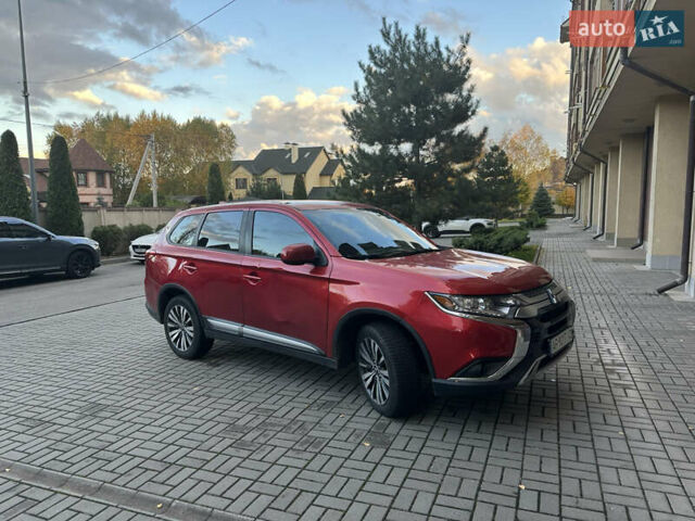 Червоний Міцубісі Аутлендер, об'ємом двигуна 2.36 л та пробігом 95 тис. км за 12500 $, фото 2 на Automoto.ua