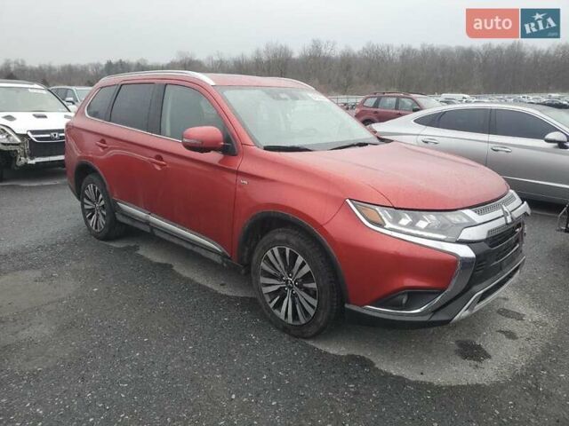 Красный Мицубиси Аутлендер, объемом двигателя 3 л и пробегом 100 тыс. км за 3000 $, фото 3 на Automoto.ua